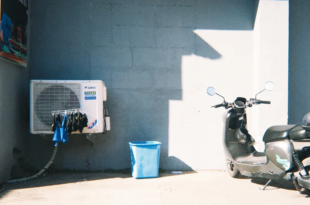 AC tune-up service on residential outdoor unit in Vancouver