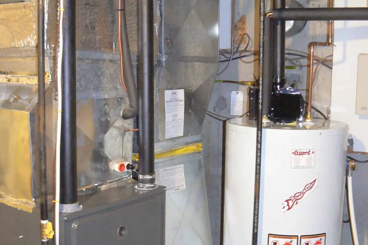New high-efficiency gas furnace installed in a Vancouver basement mechanical room
