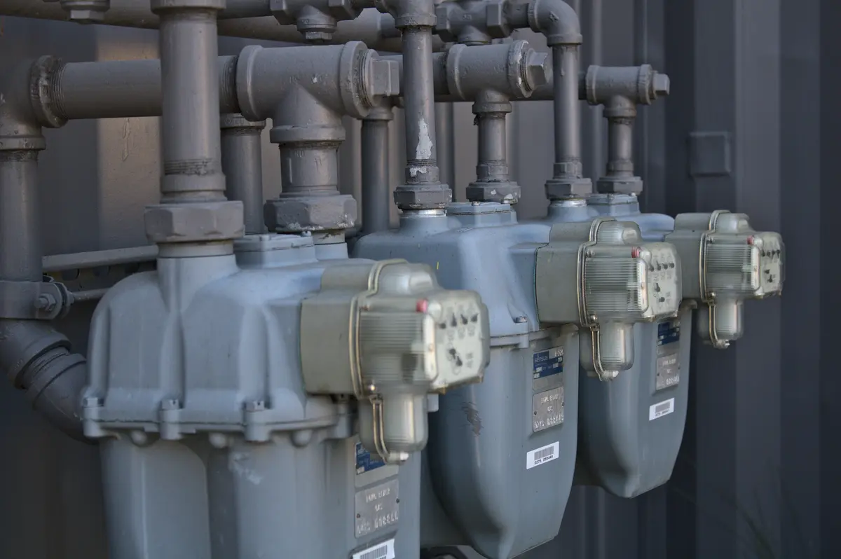 Pool heater installation with gas piping in a Vancouver backyard