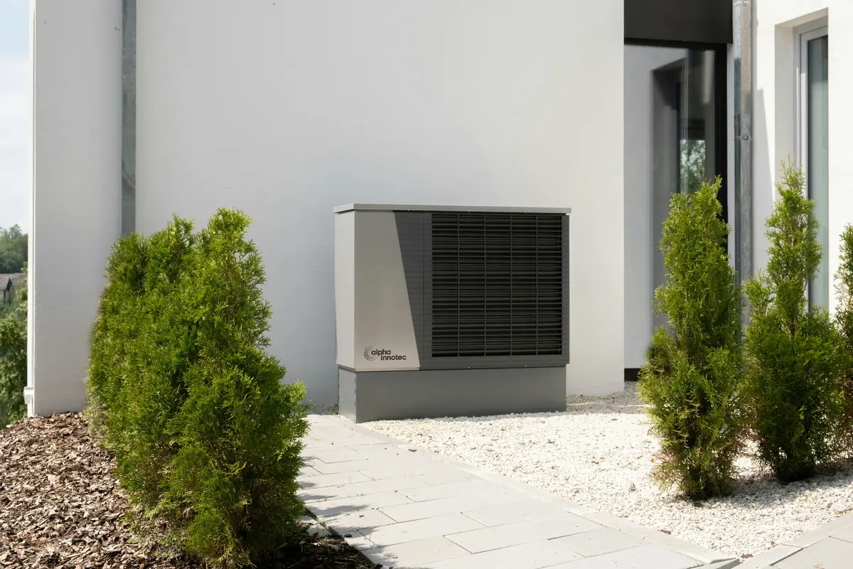 Cold-climate heat pump outdoor unit mounted on Vancouver home exterior