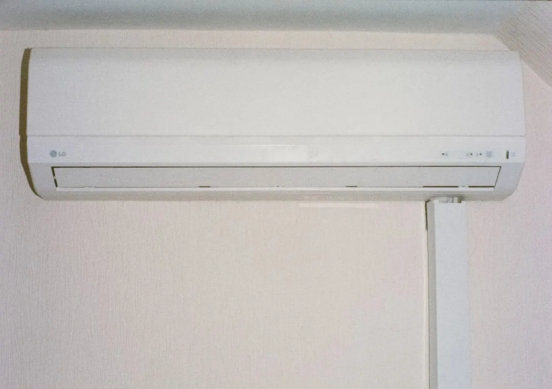 Wall-mounted ductless mini-split indoor unit in a Vancouver living room